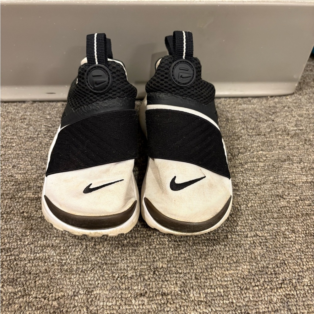 Nike Toddler Black and White Slip-On Sneakers